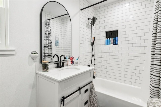 bathroom featuring vanity and shower / bath combo