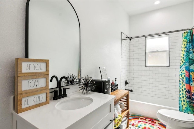 full bathroom with vanity, shower / bathtub combination with curtain, and toilet