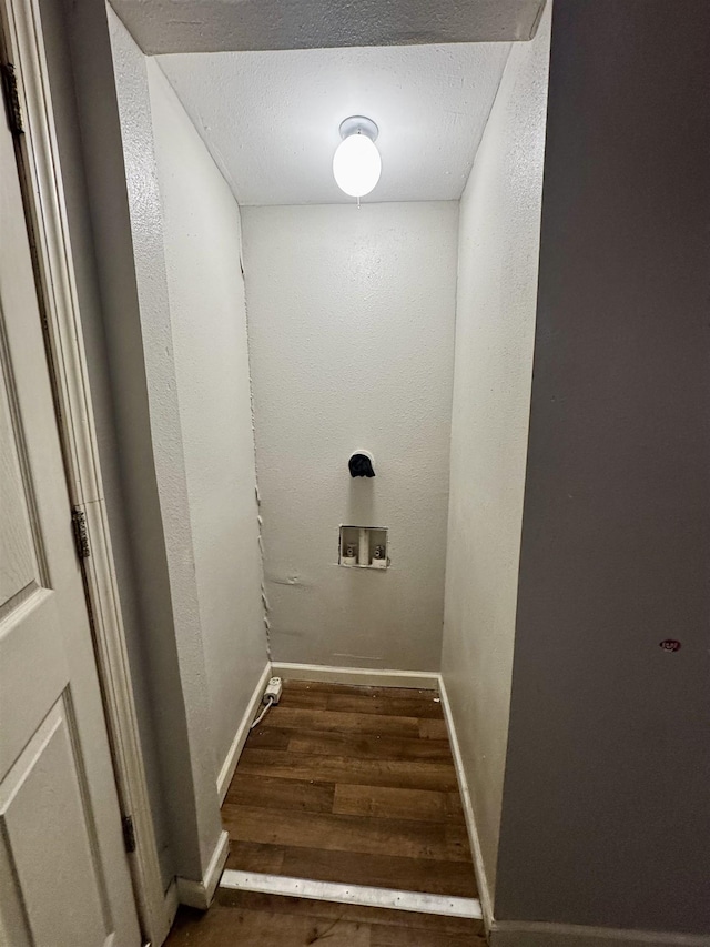 staircase featuring wood-type flooring