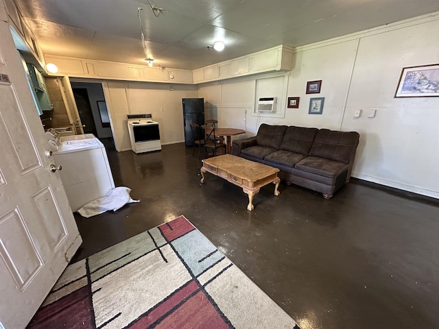 living room with washer / clothes dryer