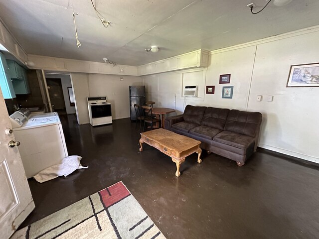 living room featuring washer / dryer