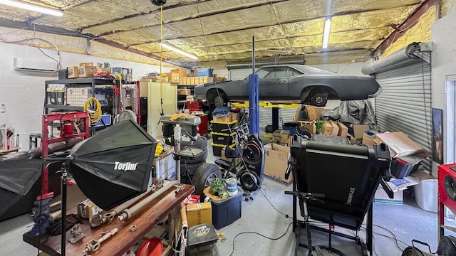 1100 Mitzi Rd, Vidor, TX 77662 - garage featuring a wall unit AC