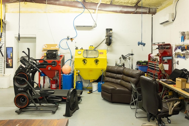 1100 Mitzi Rd, Vidor, TX 77662 - garage with an AC wall unit