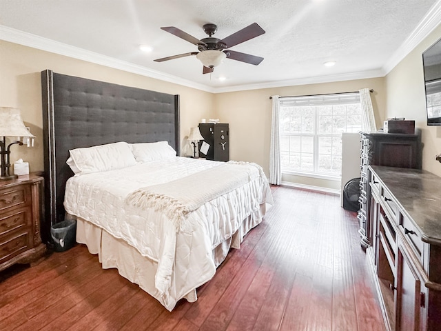 1100 Mitzi Rd, Vidor, TX 77662 - bedroom with dark wood-type flooring, recessed lighting, a ceiling fan, and crown molding