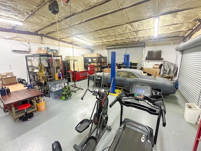 1100 Mitzi Rd, Vidor, TX 77662 - garage featuring a workshop area