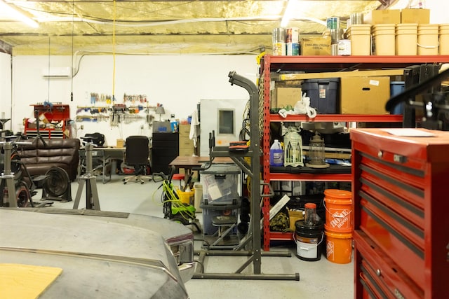 1100 Mitzi Rd, Vidor, TX 77662 - garage featuring a workshop area