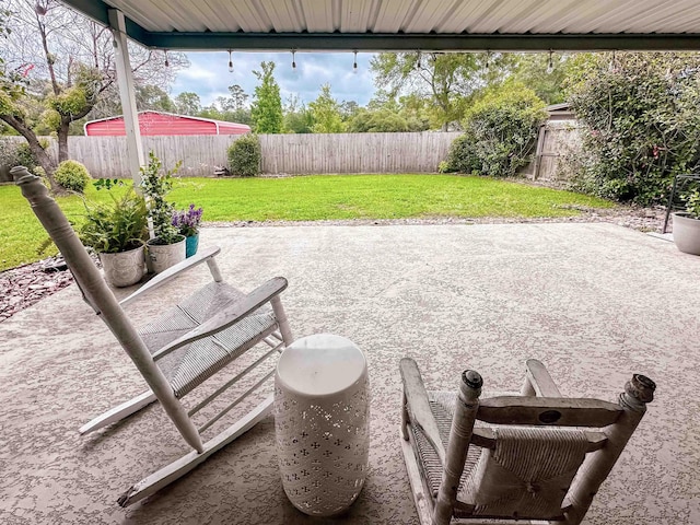 1100 Mitzi Rd, Vidor, TX 77662 - fenced backyard with a patio