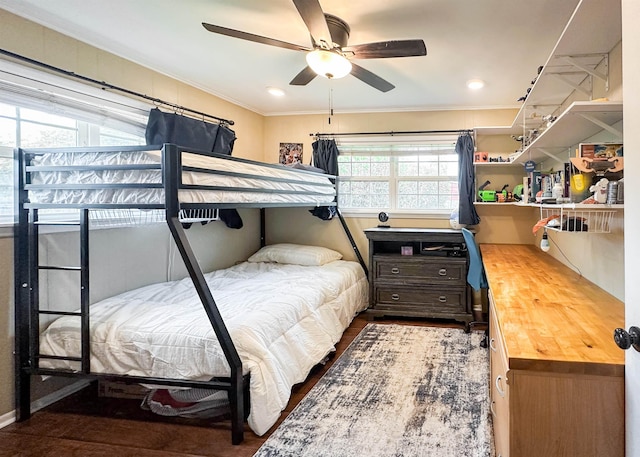 1100 Mitzi Rd, Vidor, TX 77662 - bedroom with ornamental molding, ceiling fan, and wood finished floors