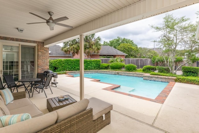 view of pool with ceiling fan, a patio, a fenced backyard, an outdoor living space, and a fenced in pool