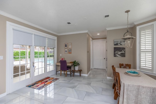 dining space with baseboards, ornamental molding, french doors, and visible vents