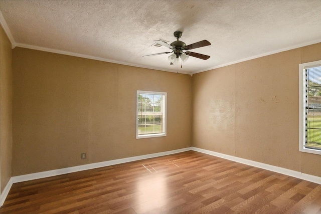 209 Boutwell Rd, Beaumont, TX 77713 - unfurnished room with wood finished floors, crown molding, ceiling fan, a textured ceiling, and baseboards