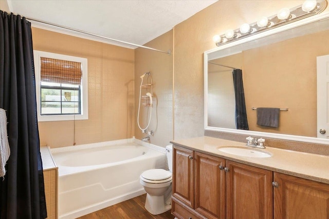 209 Boutwell Rd, Beaumont, TX 77713 - full bathroom featuring vanity, wood finished floors, shower / tub combo with curtain, and toilet