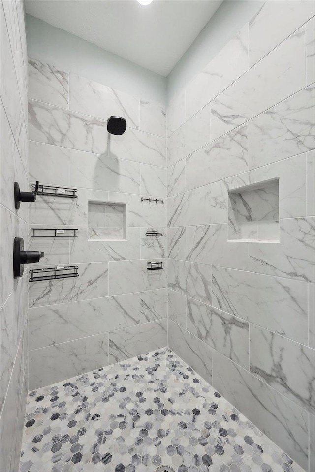 1326 Emerald Dr, Port Bolivar, TX 77650 - bathroom featuring tiled shower
