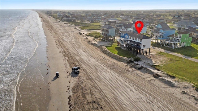1326 Emerald Dr, Port Bolivar, TX 77650 - aerial view of residential area featuring waterfront with a beach