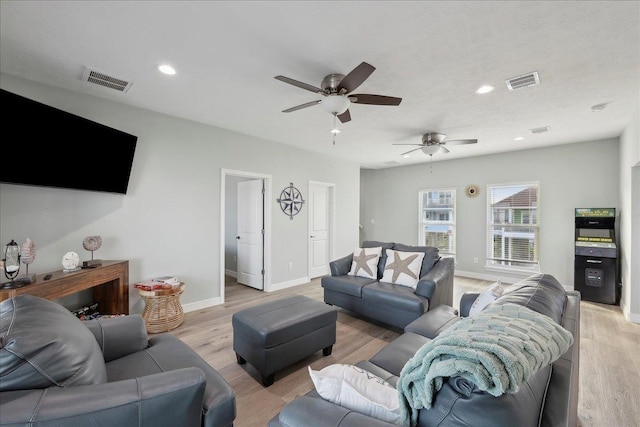 1326 Emerald Dr, Port Bolivar, TX 77650 - living area featuring ceiling fan, light wood-style flooring, and recessed lighting