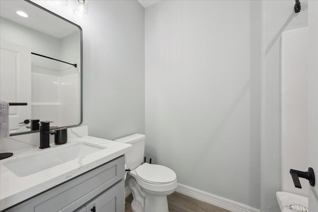 1326 Emerald Dr, Port Bolivar, TX 77650 - bathroom with vanity, wood finished floors, and a shower