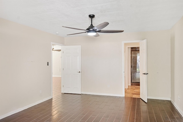 spare room featuring ceiling fan