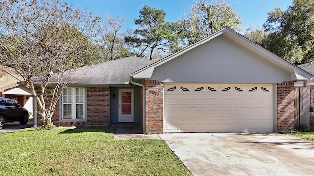 ranch-style house featuring a garage and a front yard