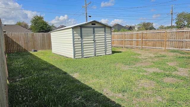 view of outbuilding featuring a yard