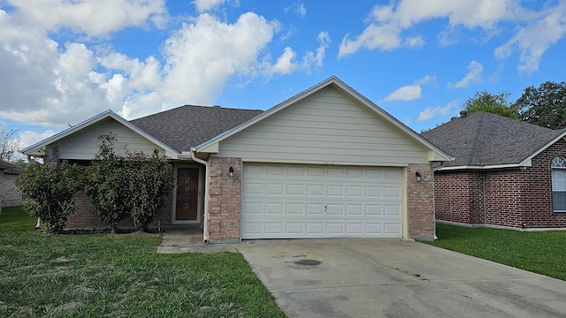 single story home featuring a front yard and a garage