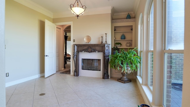 10940 Sheila Ct, Beaumont, TX 77705 - living room with crown molding, light tile patterned floors, plenty of natural light, and arched walkways