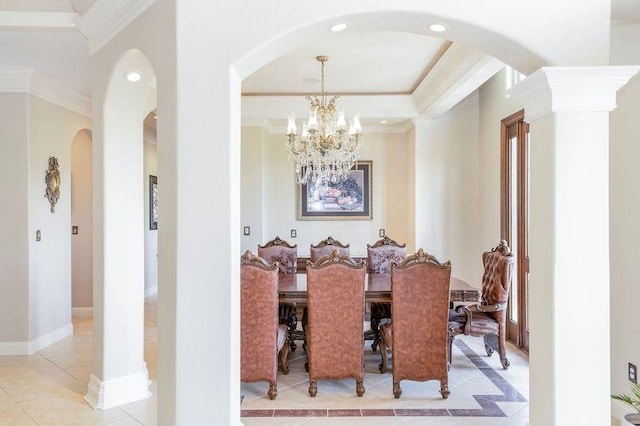 10940 Sheila Ct, Beaumont, TX 77705 - dining room with ornamental molding, arched walkways, a chandelier, light tile patterned flooring, and recessed lighting