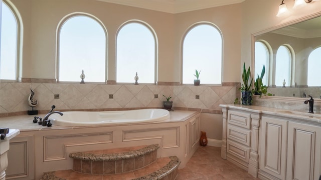 bathroom with vanity, tile patterned floors, a bath, and ornamental molding