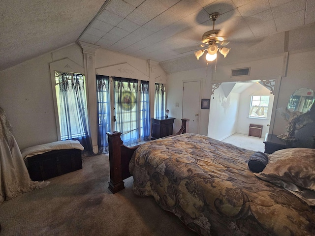 bedroom featuring carpet floors, ceiling fan, and lofted ceiling