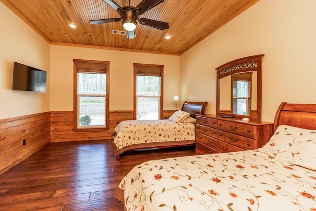 bedroom with ceiling fan, dark hardwood / wood-style flooring, wooden ceiling, and ornamental molding