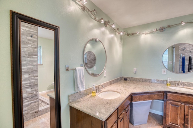 bathroom featuring tile patterned floors and vanity