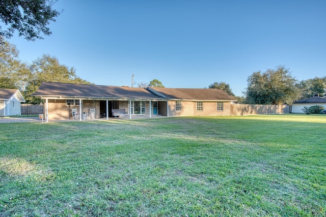 view of front of property with a front lawn