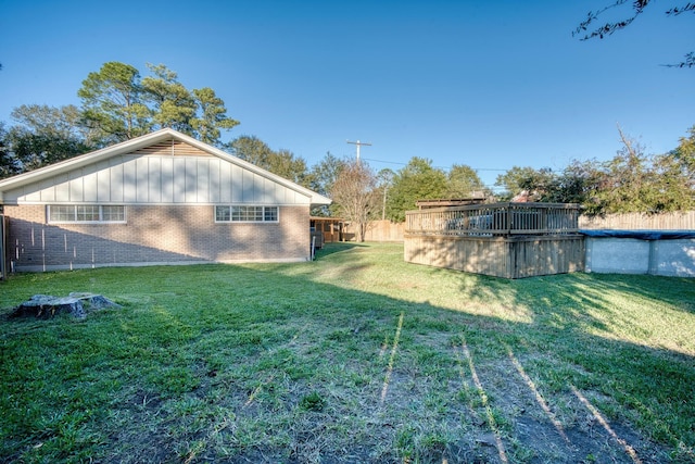 view of yard featuring a covered pool