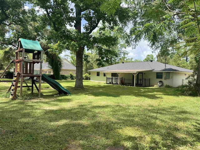 view of yard with a playground