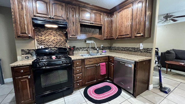 kitchen with dark brown cabinets, sink, stainless steel dishwasher, and black range with gas cooktop