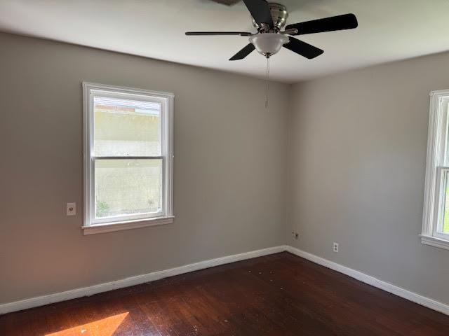 6 Circle Q St, Orange, TX 77630 - unfurnished room with wood finished floors, baseboards, and ceiling fan