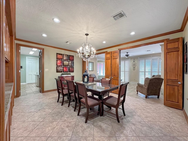 dining room with light tile patterned floors, crown molding, and a wealth of natural light