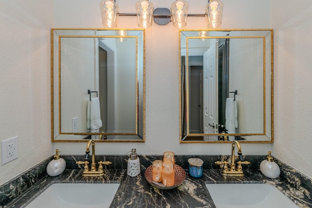 bathroom with double vanity and a sink