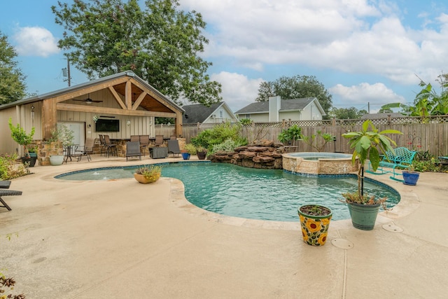 view of pool with a fenced in pool, a fenced backyard, a patio, and an in ground hot tub