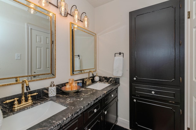 full bath with double vanity and a sink