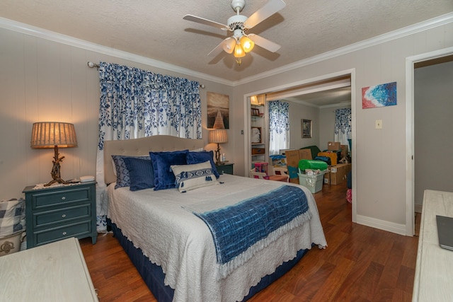 bedroom featuring crown molding, a textured ceiling, a ceiling fan, and dark wood-style flooring