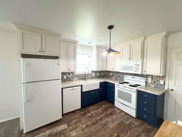 kitchen featuring white appliances, white cabinets, sink, blue cabinetry, and decorative light fixtures