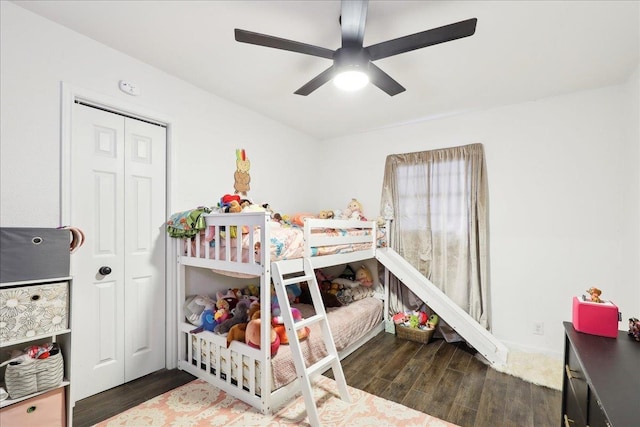 bedroom featuring a closet, a ceiling fan, and wood finished floors