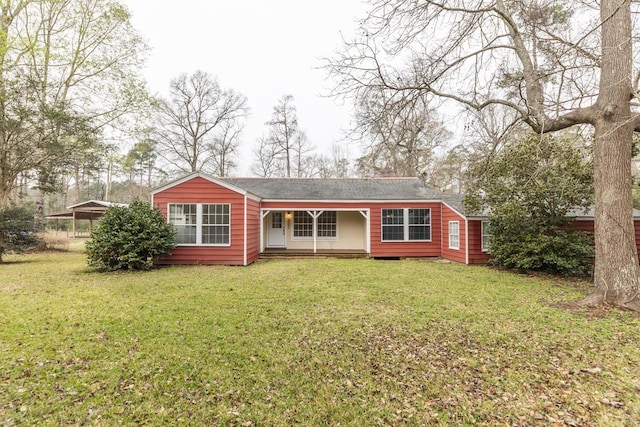 ranch-style home with a front yard