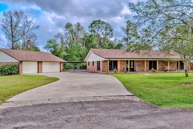 ranch-style house with a front yard and a garage