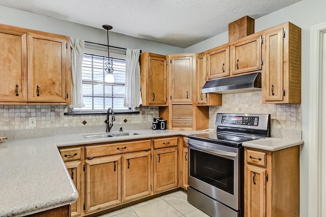 kitchen featuring sink, hanging light fixtures, electric range, light tile patterned floors, and a textured ceiling