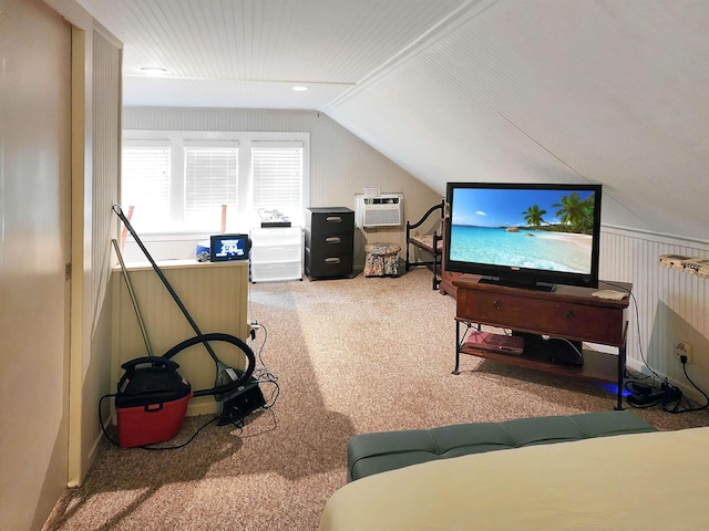 interior space with vaulted ceiling and a wall mounted air conditioner