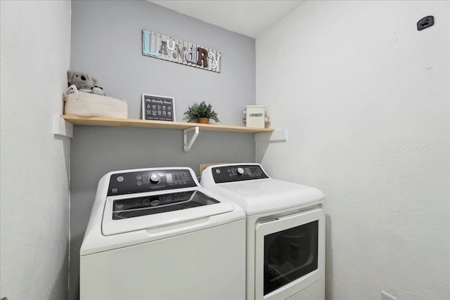 laundry room featuring laundry area and washer and dryer