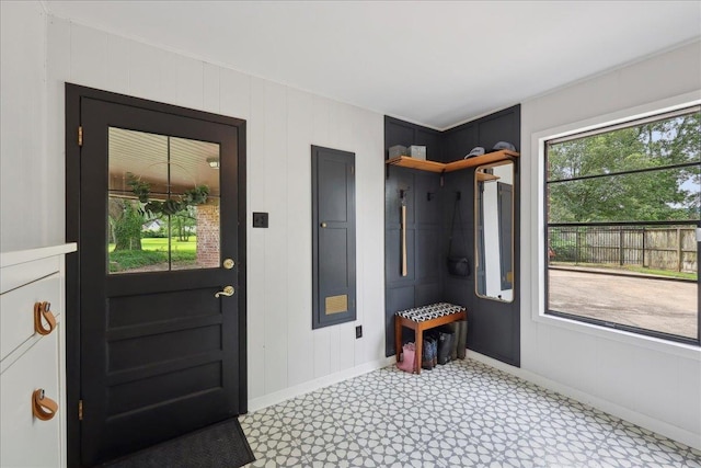 1210 Nottingham Ln, Beaumont, TX 77706 - mudroom featuring light floors and baseboards