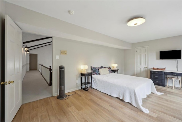 1210 Nottingham Ln, Beaumont, TX 77706 - bedroom featuring light wood-style floors and baseboards