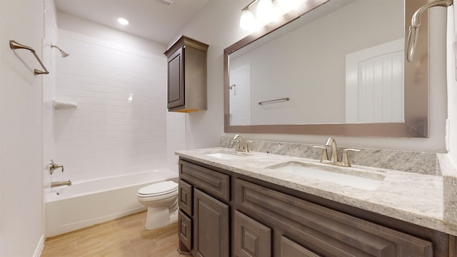 225 Sycamore Ct, Lumberton, TX 77657 - full bathroom featuring double vanity, wood finished floors, and shower / bathtub combination
